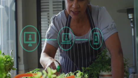 animación de iconos digitales sobre mujer biracial en la cocina
