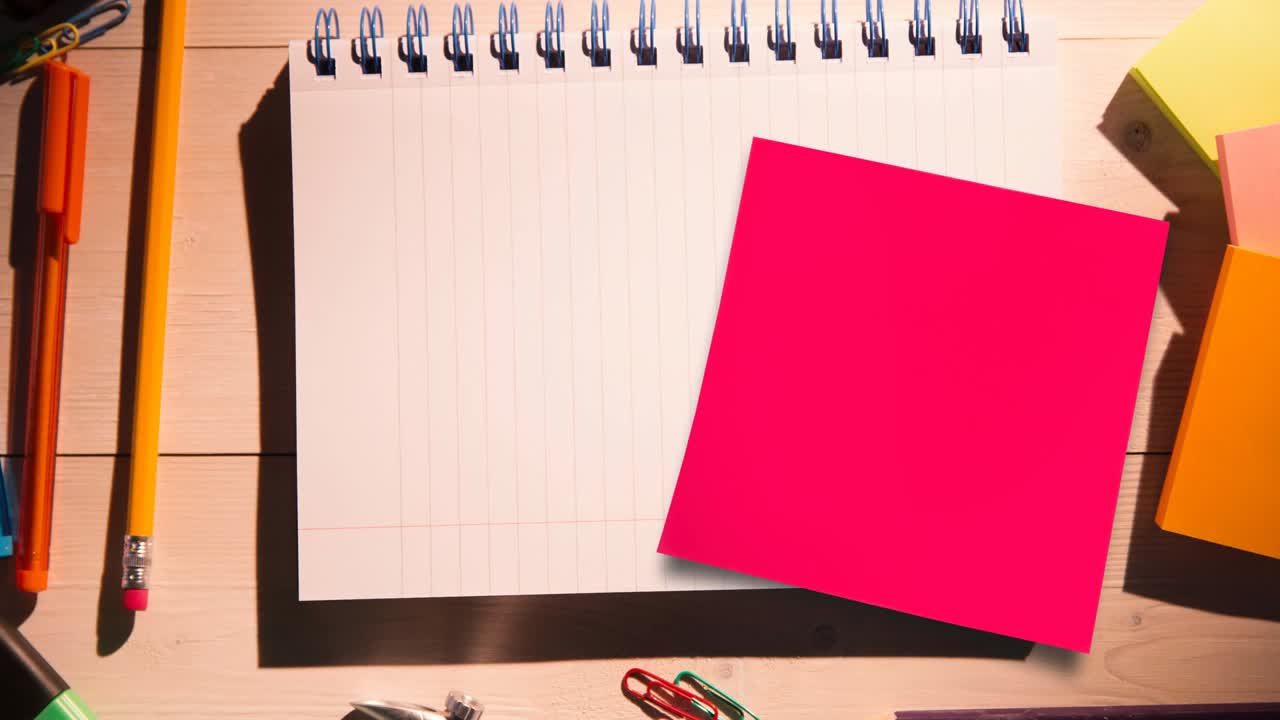 Animation of memo note with copy space over notebook on desk