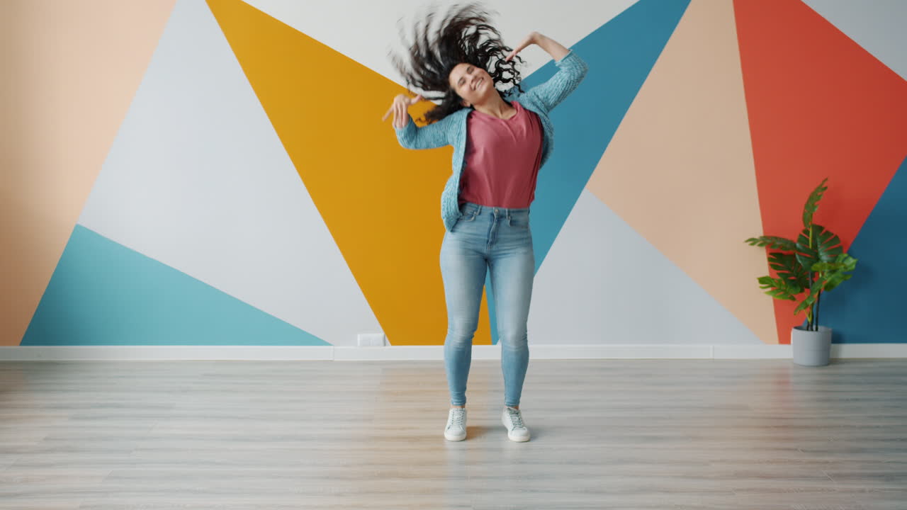 Woman Dancing in a Colorful Room