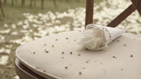 Close-view-of-the-wedding-flowers-on-an-aisle-row-seat