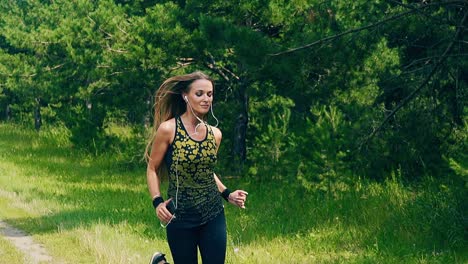 cu slow motion front shot young girl goes in for sports in the morning