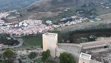 jaen's castle saint catalina castle spain shoot with a drone at 4k 24fps showing the exterior and the city from multiple points on a afternoon in december.