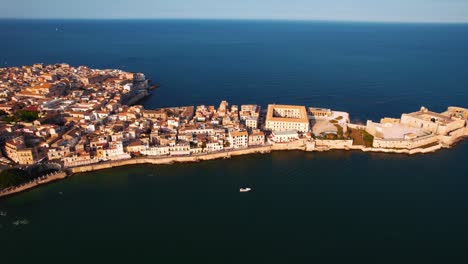 aerial view of castello maniace, ortigia, syracuse, sicily. ancient old town walls by the sea in italy.