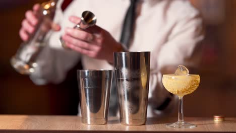 close up shot of a professional bartender mixing drinks