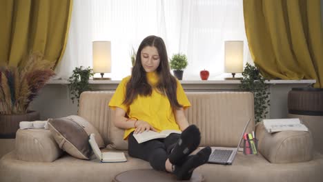 Happy-Female-student-reading-a-book.