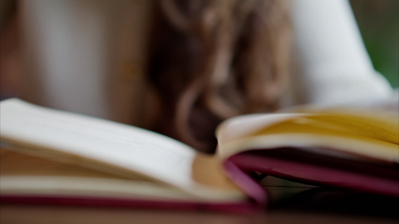 Woman reading through the menu at a restaurant