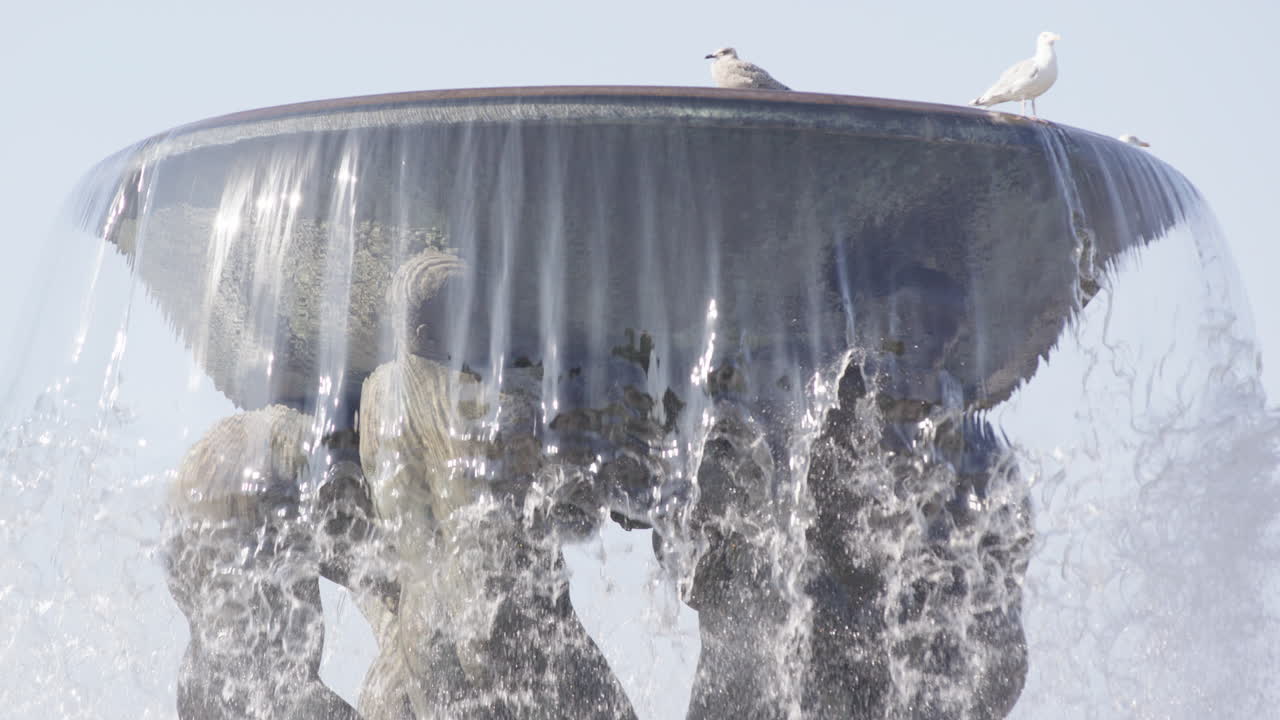 Curtains of slow motion water flow from The Great Fountain in Vigeland Park Oslo