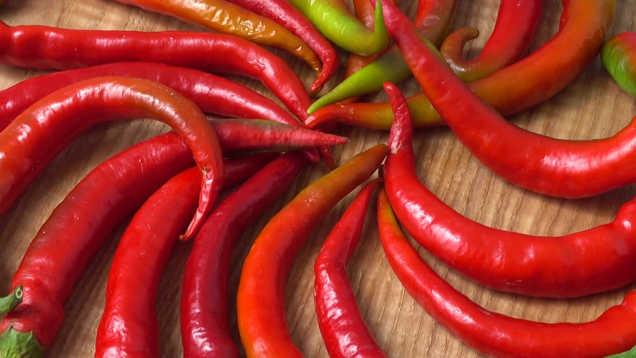Red chilli, pepper. Shooting in the movement
