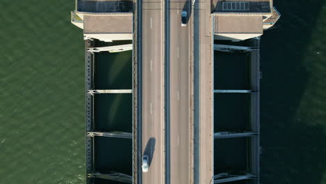 Overhead-View-Of-Cars-Traveling-Across-Haringvlietdam-Over-Haringvliet-Estuary-In-Netherlands