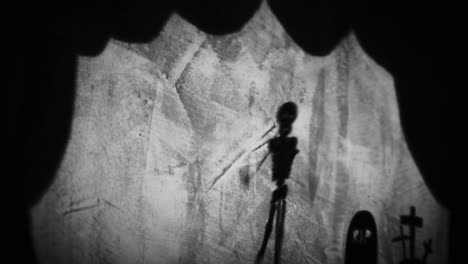 spooky shadow puppets of skeletons and ghosts
