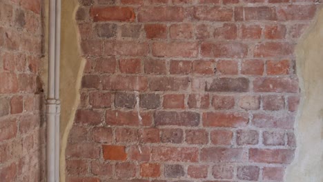primer plano de una vieja pared de ladrillo rojo