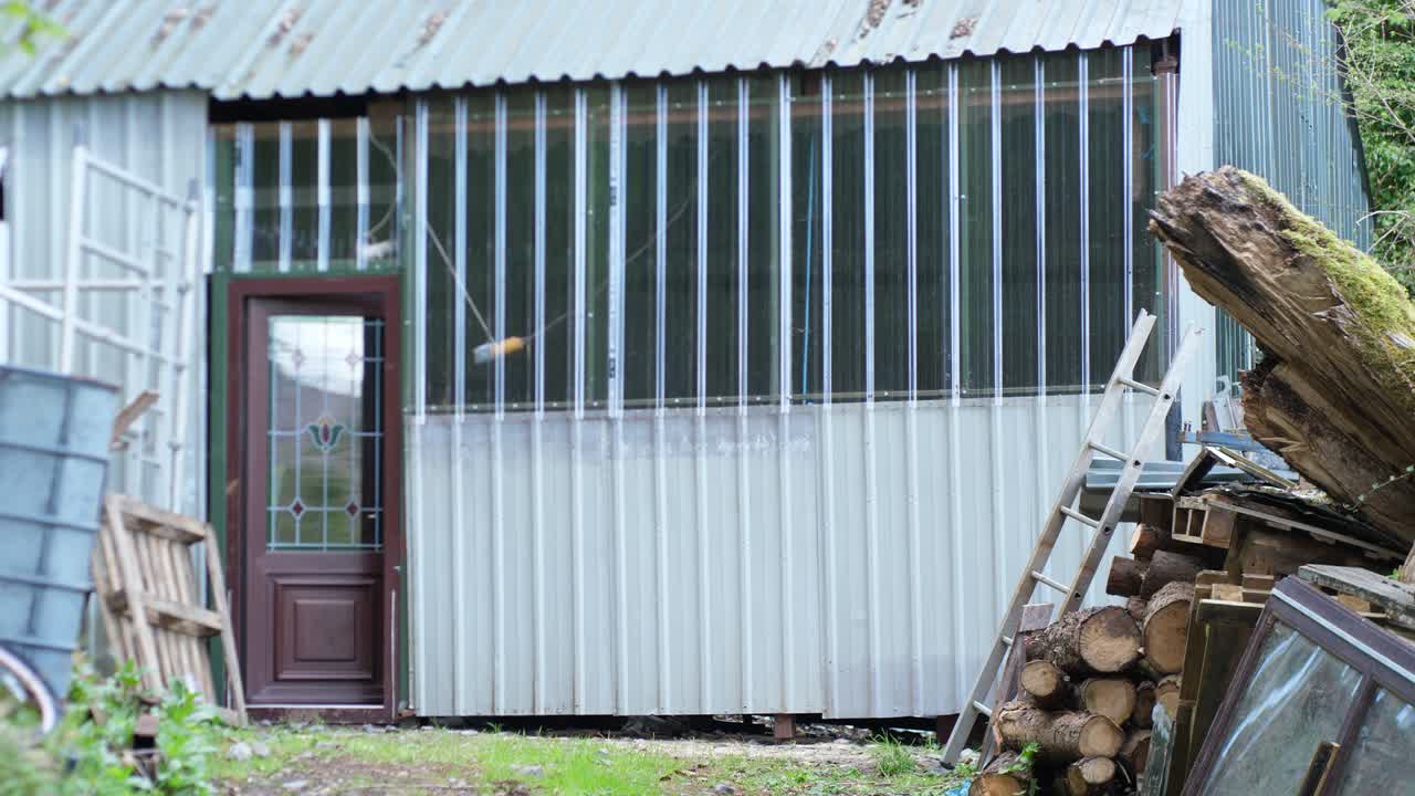One Person Leaves the Garage After Turning Off the Light