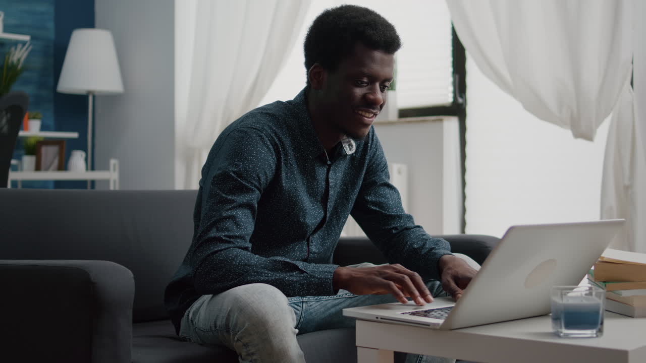 Working from home black man in flat apartment