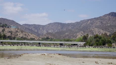 mountains, freeway and a lake