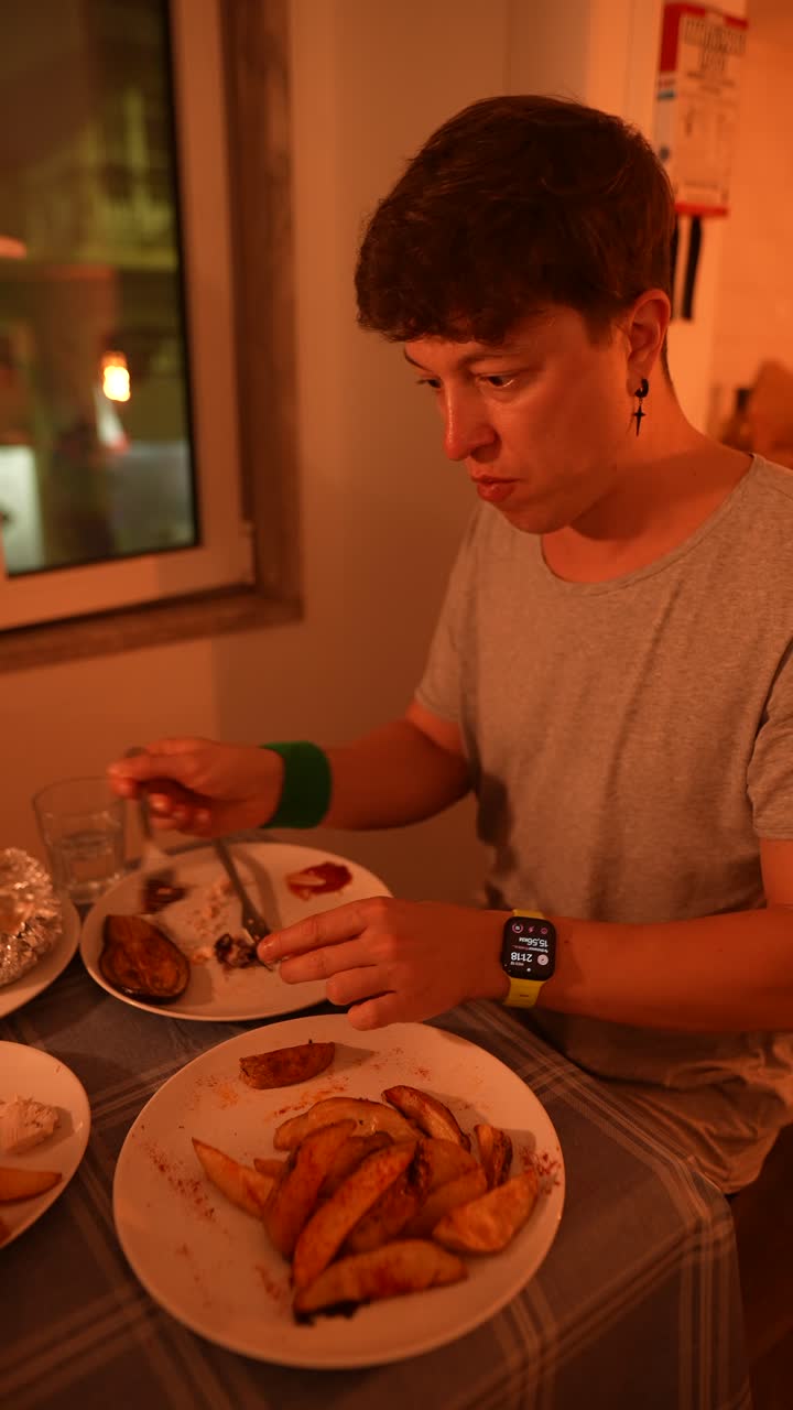 Person eating dinner at home