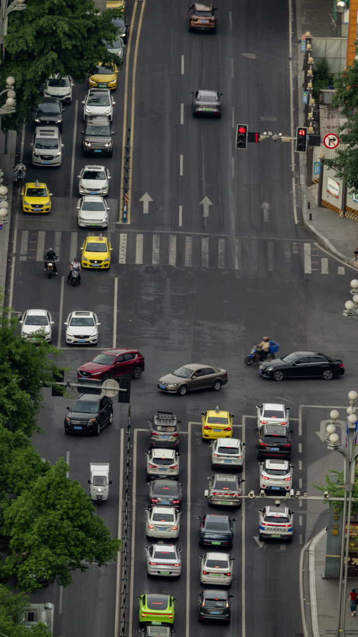 Timelapse of Chongqing street scene from a high vantage point in vertical