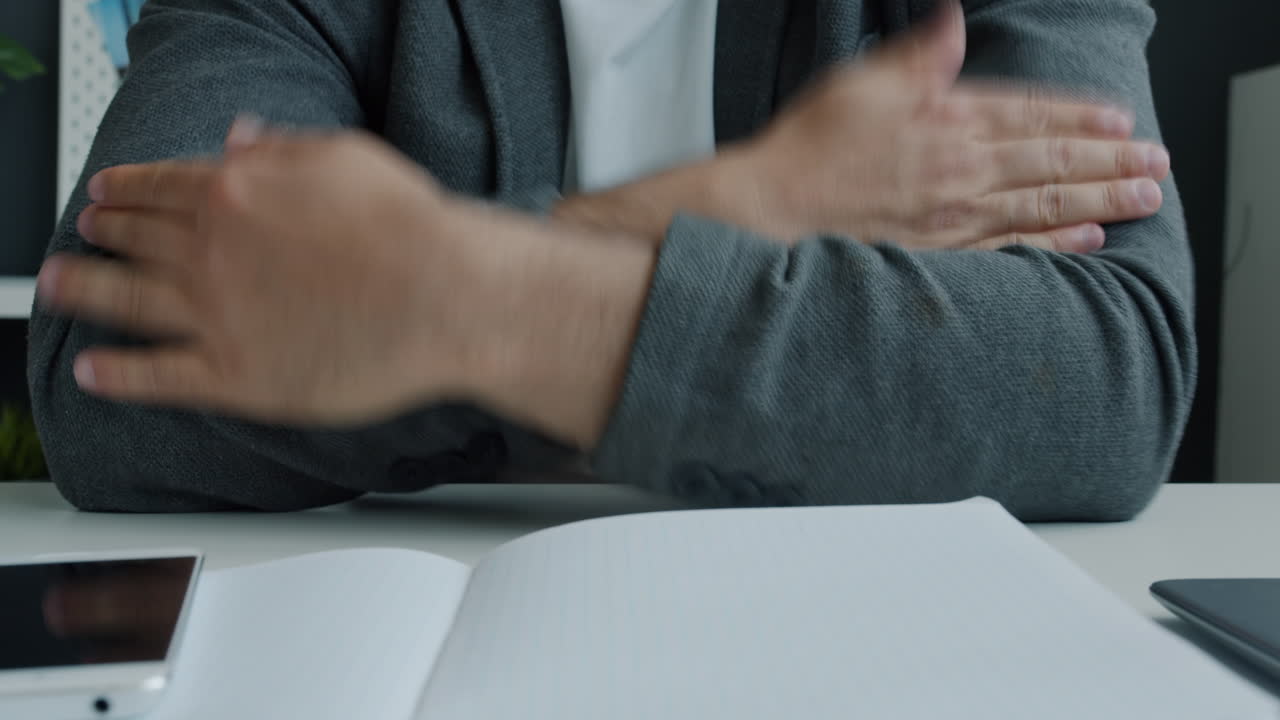 Person sitting at a desk, working