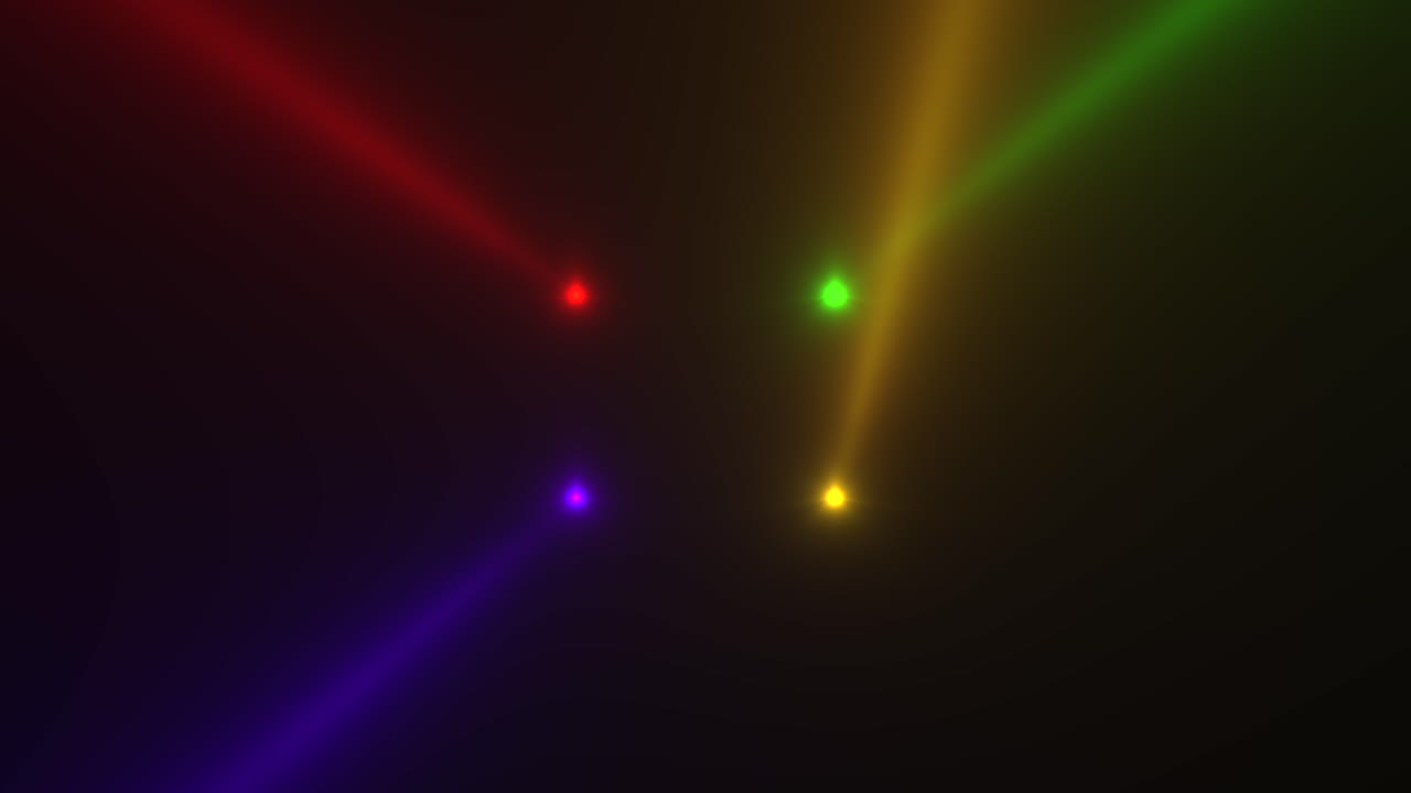 Colorful glowing spotlight beams on black gradient stage