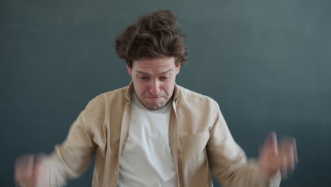 Man Expressing Confusion or Frustration