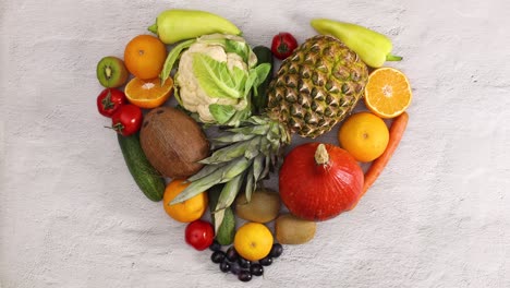 fresh fruits and vegetables make heart. stop motion