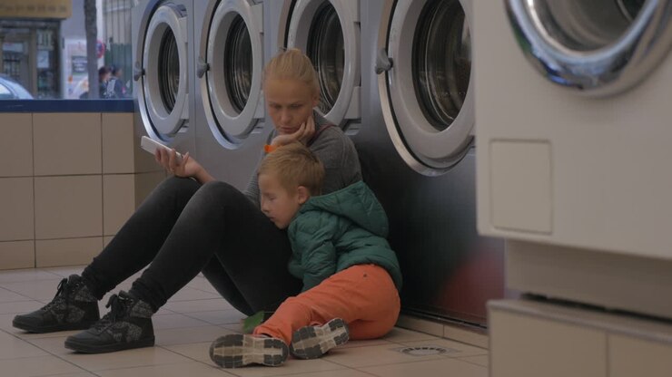 Mother and child in the laundry