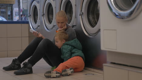 mother and child in the laundry