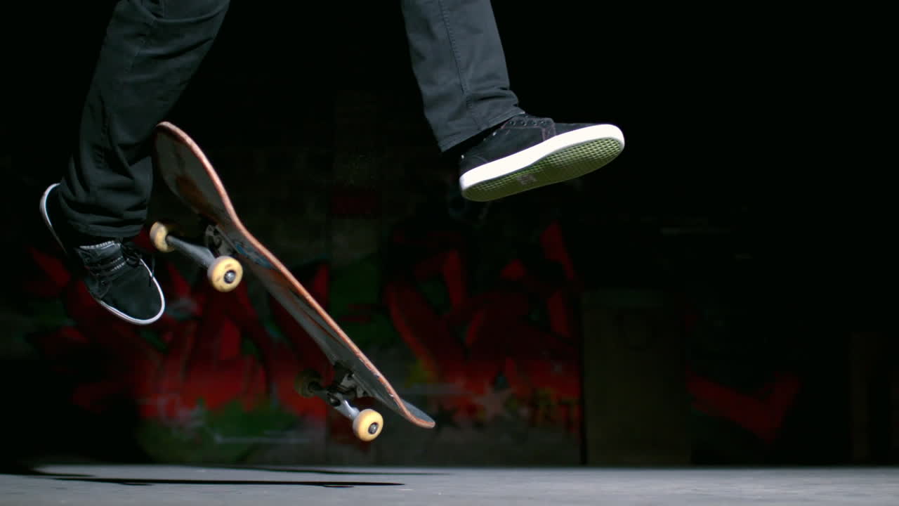 Skater performing 360 flip trick 