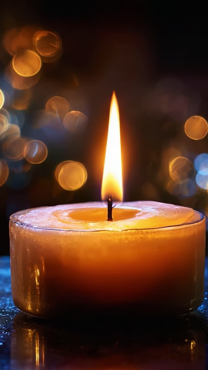 A Beautifully Lit Candle with Warm Glow, Capturing the Tranquil Ambiance of Soft Flickering Flame, Surrounded by a Gentle Bokeh Effect, Perfect for Evoking Serenity and Peaceful Moments