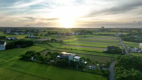 Aerial-view-of-sunlight-reflection-on-solar-panels-unit-installed-on-roof-in-the-morning