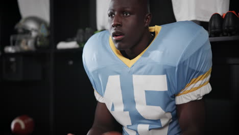 football player in locker room