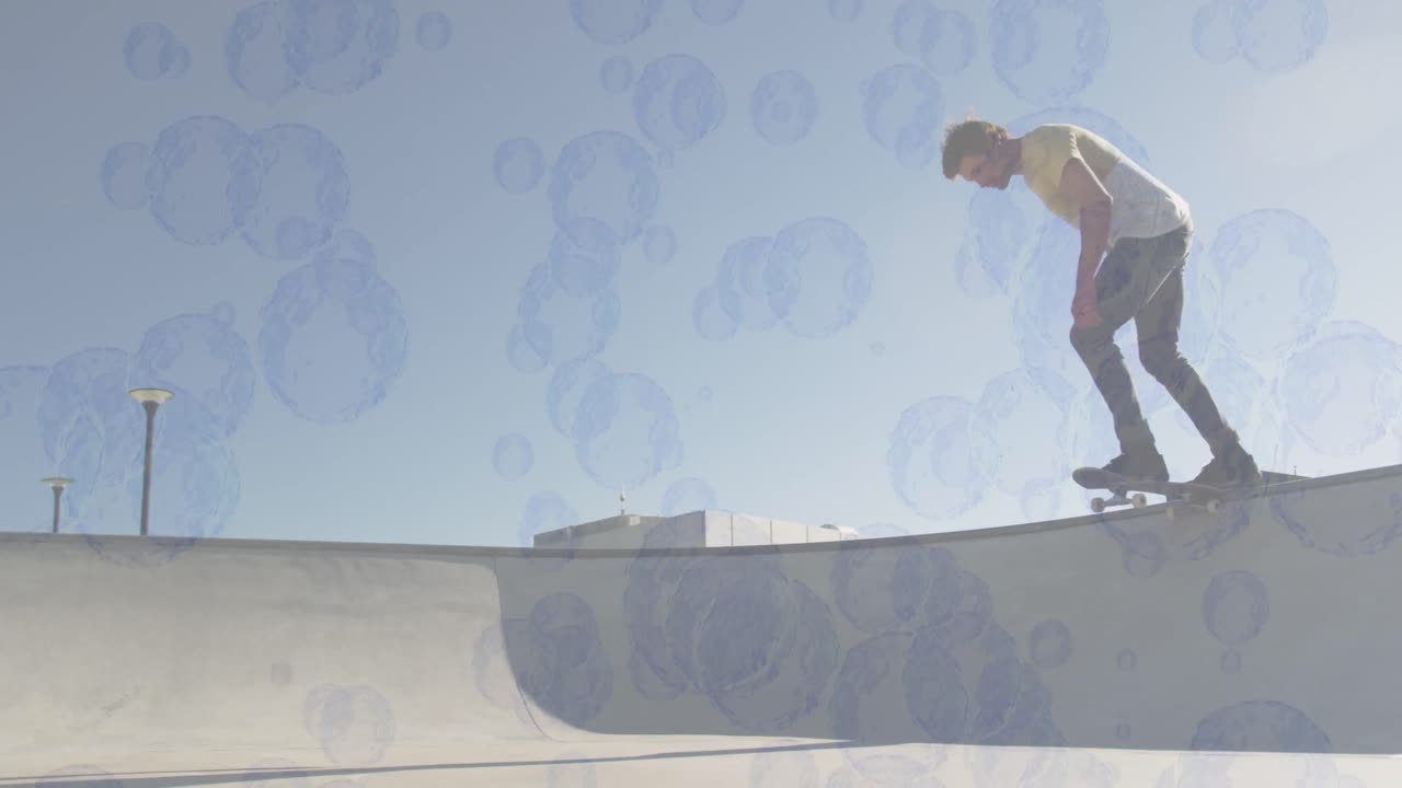 animación de burbujas sobre hombre caucásico patinando