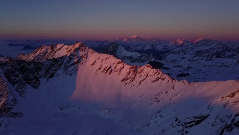 majestic alpine sunrise/sunset over snowy peaks