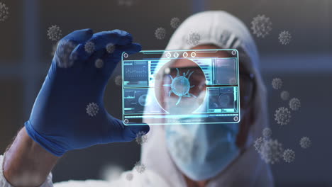 Animation-of-virus-cells-and-digital-interface-over-male-doctor-wearing-face-mask