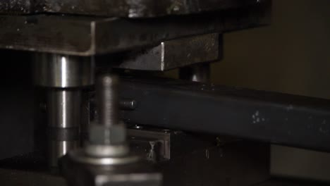 metal masterpiece in action: a machine slices through construction elements, showcasing efficiency and precision in this dynamic stock footage