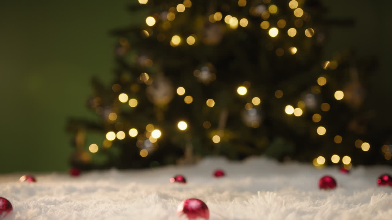 Gift Packages Fall on a White Carpet at Christmas
