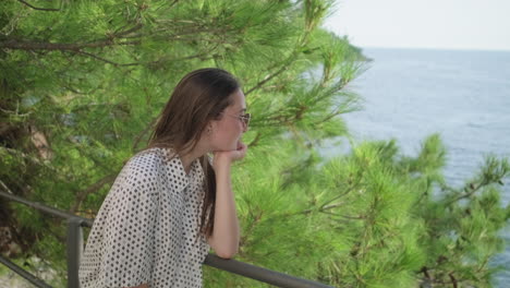 woman enjoying a scenic coastal view