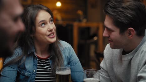 Two-caucasian-friends-meeting-in-the-pub