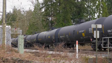 Freight-Train-Rolling-Down-the-Railway-Track,-Static,-Day