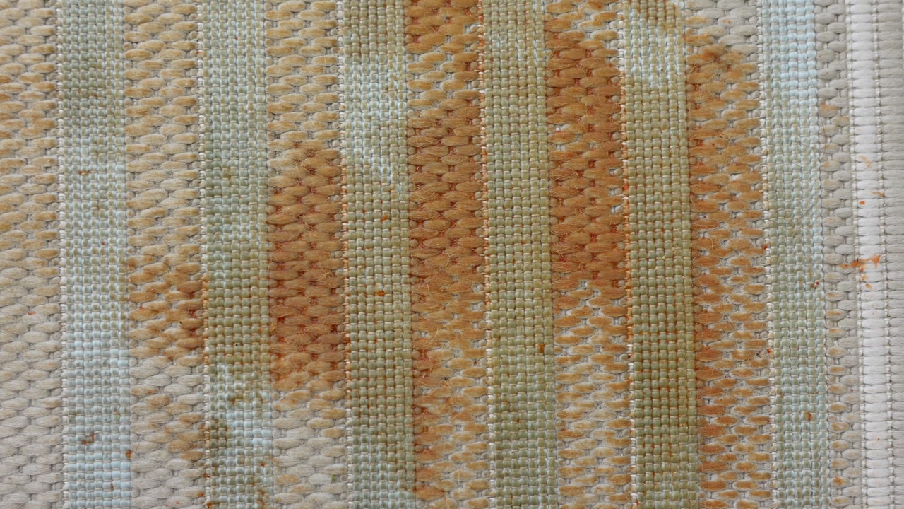 Close-up of Wet and Stained Striped Fabric