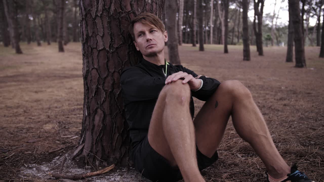 Thirsty Sad Lonely Depressed Man against Tree