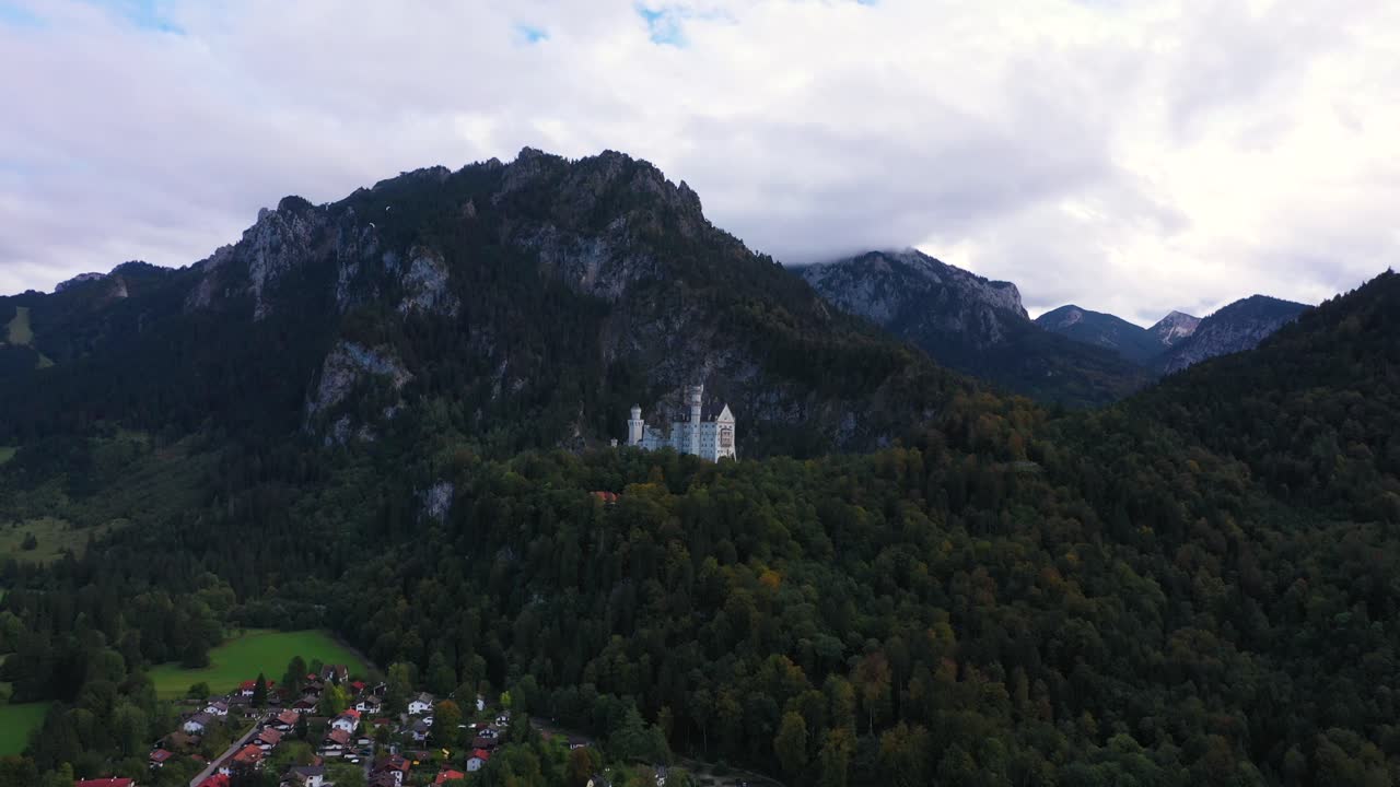 Drone flying to Castle Neuschwanstein and mountains in Bavaria, Germany in 4k