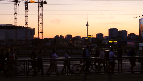 silhouetted commuters in berlin