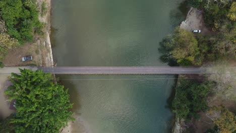 aerial view of done over river bridge