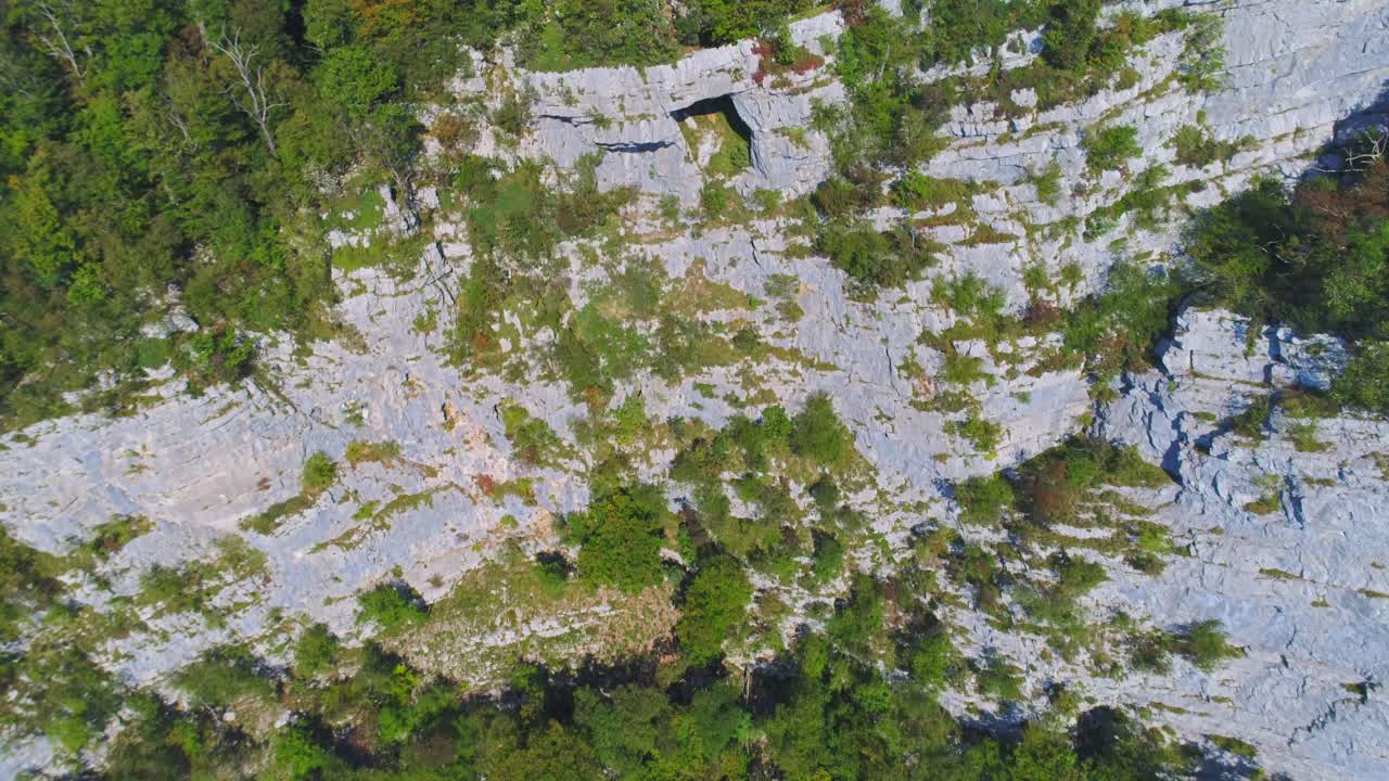 top panoramic of vertigo inducing cliff and forest, Kostel, Slovenia