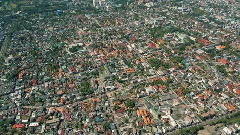 4K-Cinematic-urban-drone-footage-of-a-panoramic-aerial-view-of-the-city-of-Chiang-Mai,-Thailand-on-a-sunny-day