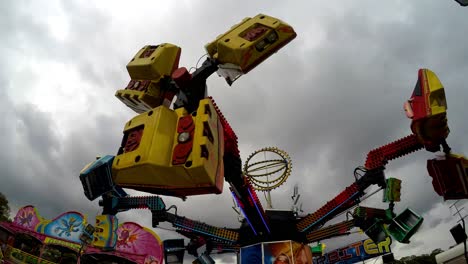 Orbiter-fairground-ride,-spinning