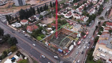 cinematic aerial view of skyscrapers in construction with city view, tel aviv, israel