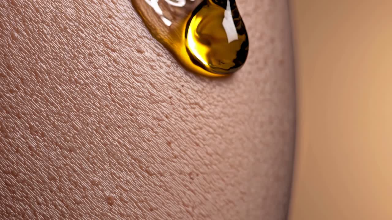 Applying face oil to skin