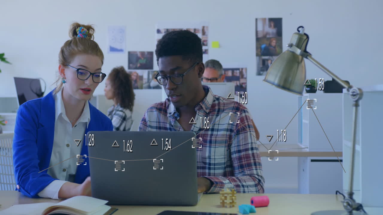 Collaborating on laptop, colleagues analyzing data with processing animation overlay