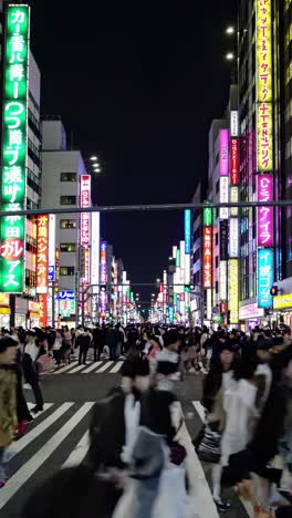 busy night street in tokyo, japan